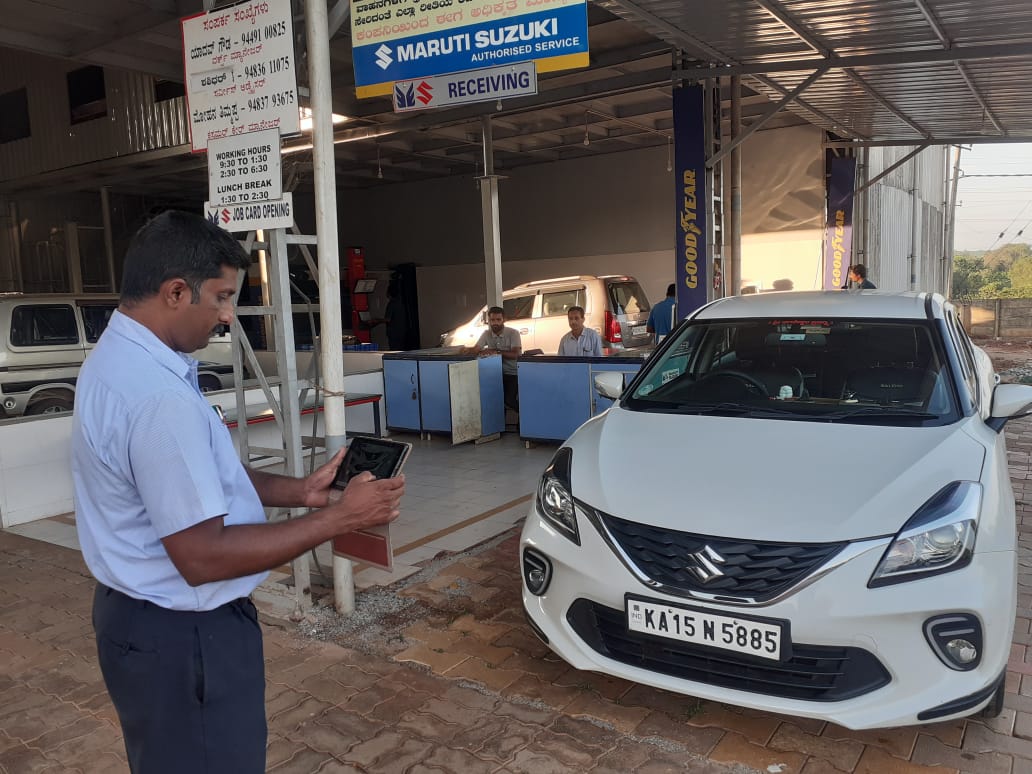 Service Advisor opening job card Using TAB at Mallika Auto Sagara